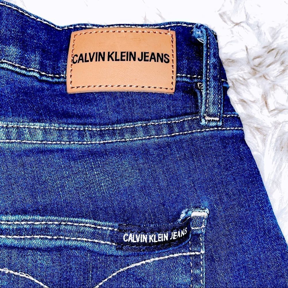 Calvin Klein High Rise Raw Hem Denim Shorts - Picture 6 of 9